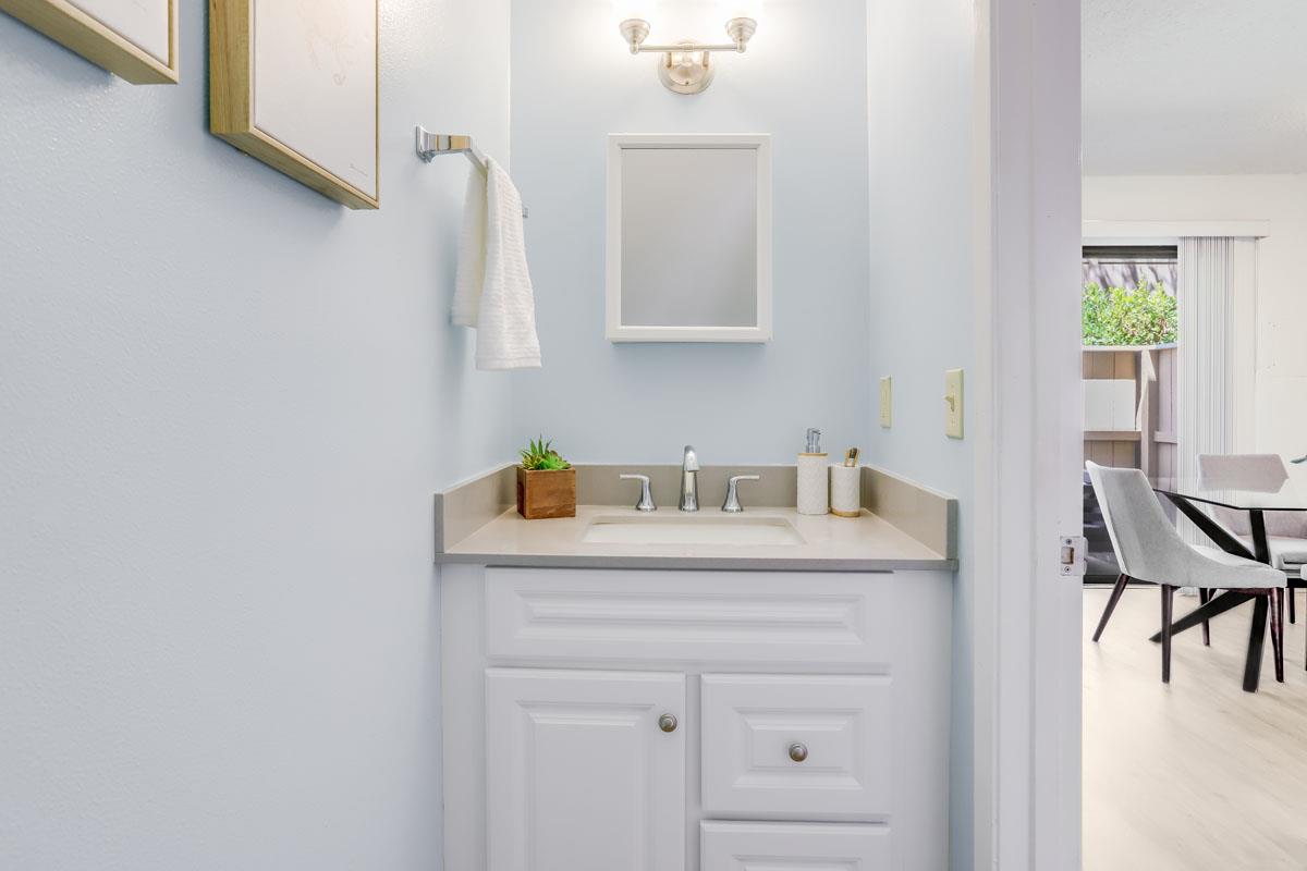 3003 Kaiser Drive, Unit D Santa Clara, CA 95051 - Photo 12 of 20 a utility room with a sink cabinets and wooden floor