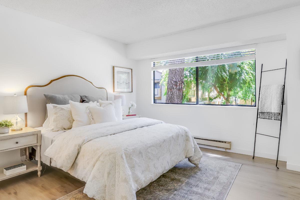 3003 Kaiser Drive, Unit D Santa Clara, CA 95051 - Photo 14 of 20 a bedroom with a bed and a window