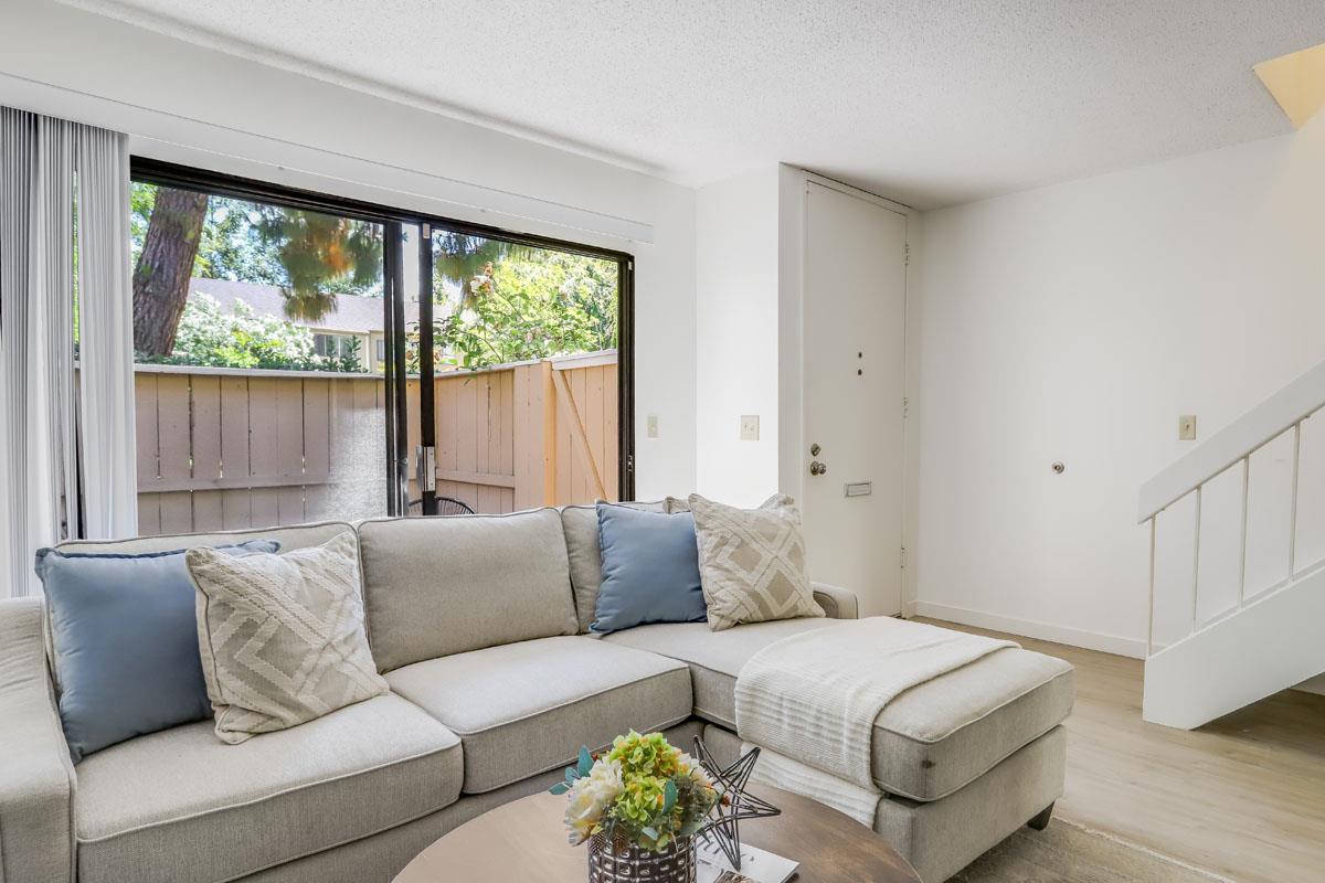 3003 Kaiser Drive, Unit D Santa Clara, CA 95051 - Photo 4 of 20 a living room with furniture and a large window