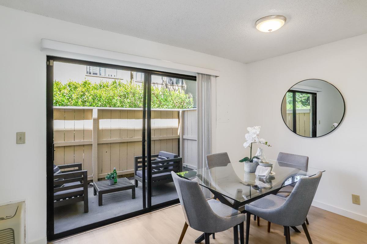 3003 Kaiser Drive, Unit D Santa Clara, CA 95051 - Photo 6 of 20 a dining room with furniture and a floor to ceiling window