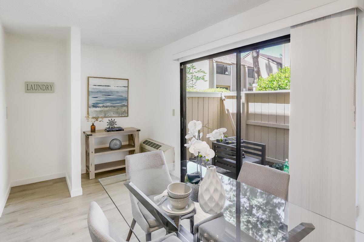 3003 Kaiser Drive, Unit D Santa Clara, CA 95051 - Photo 7 of 20 a living room with furniture and a large window