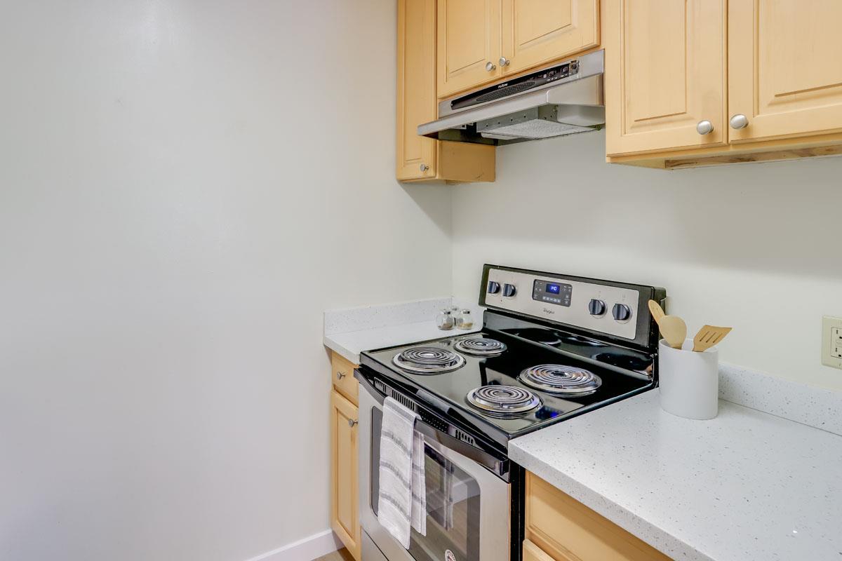 3003 Kaiser Drive, Unit D Santa Clara, CA 95051 - Photo 10 of 20 a stove top oven sitting inside of a kitchen