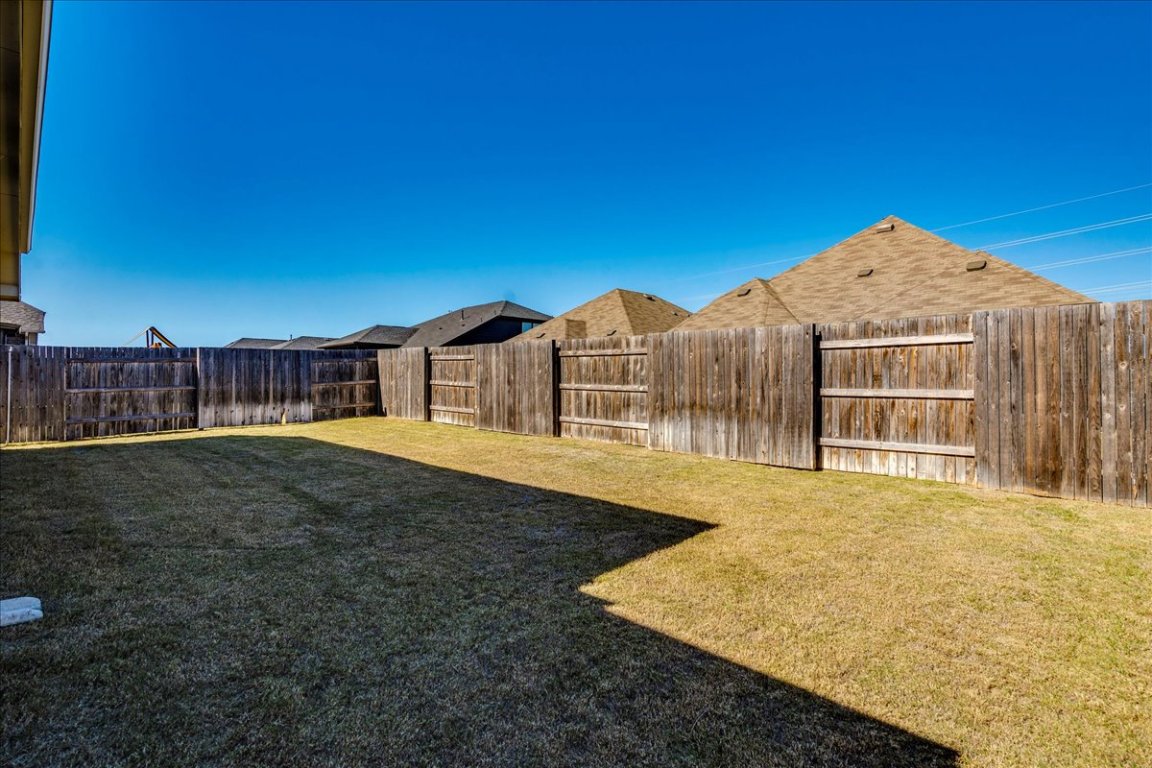 409 Durian Loop Buda, TX 78610 - Photo 25 of 30 View of fenced backyard