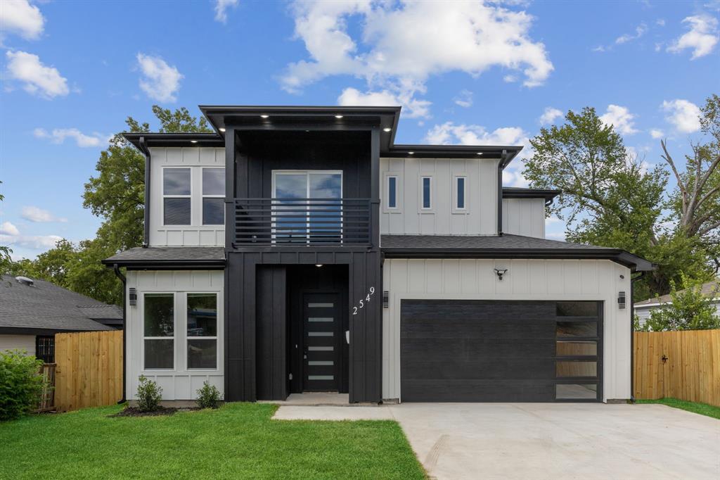 2549 East Overton Road Dallas, TX 75216 - Photo 1 of 1 a front view of a house with a garden