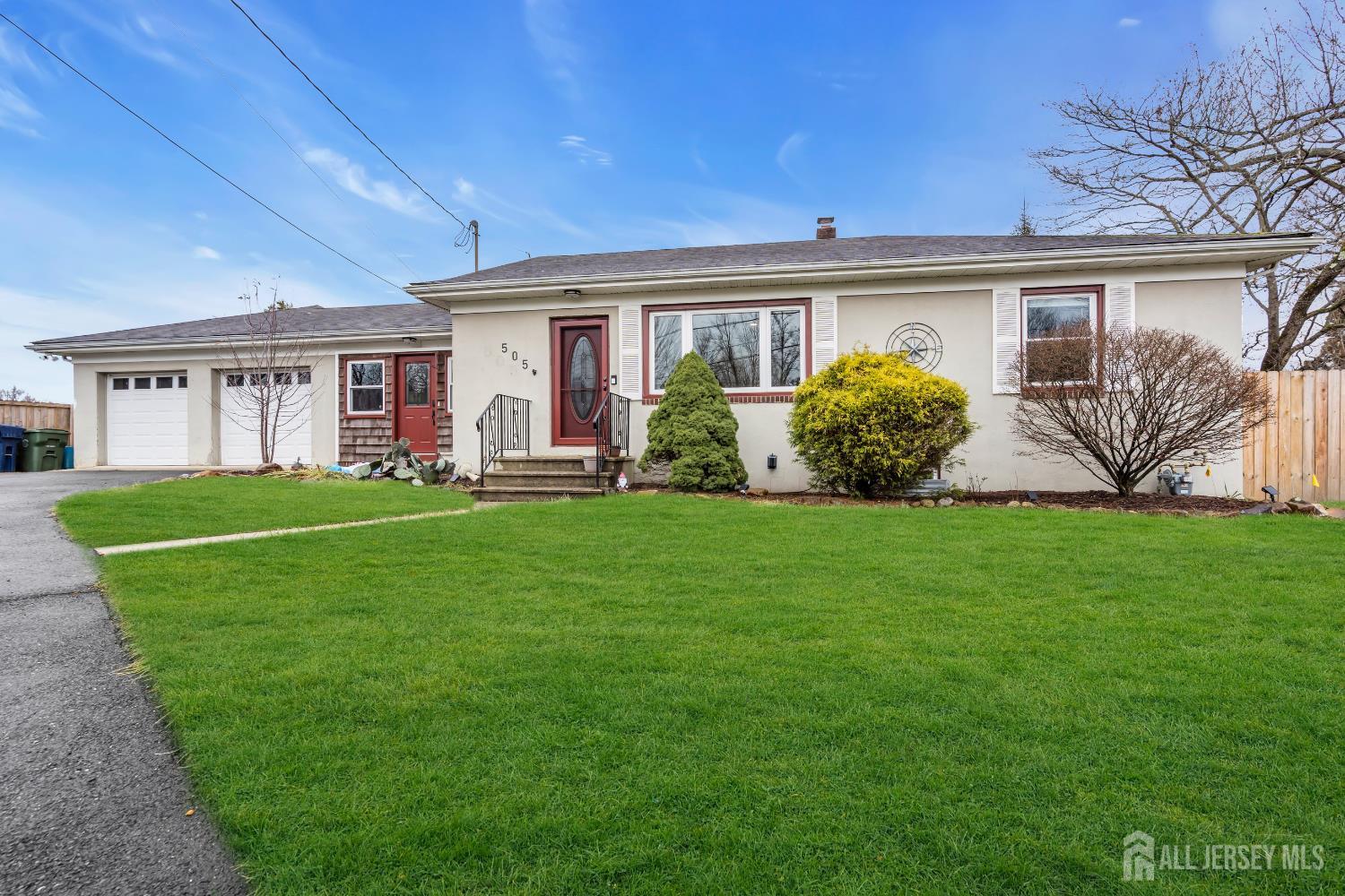505 Summit Street Hightstown, NJ 08520 - Photo 1 of 30 a front view of a house with garden and porch