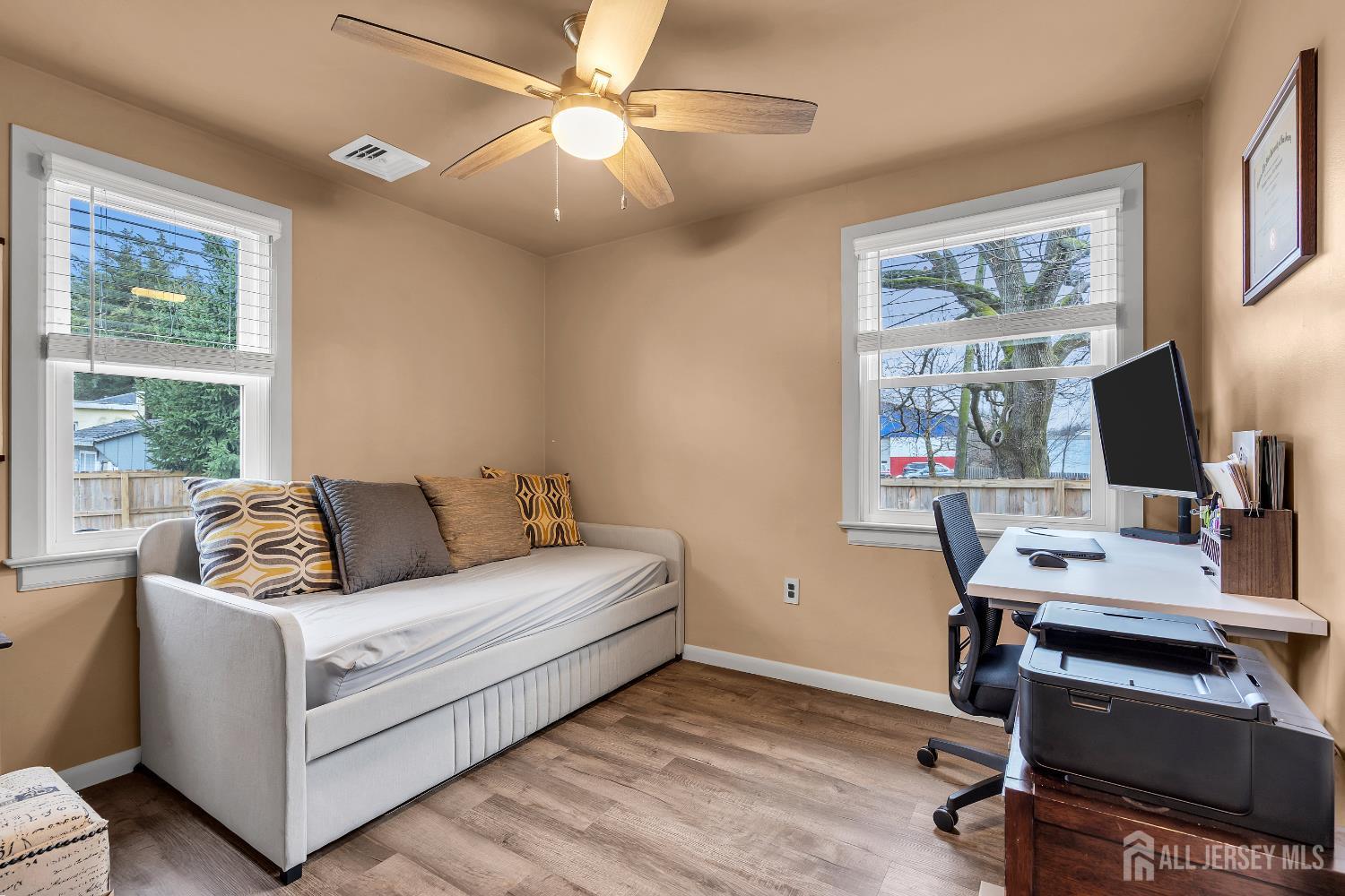 505 Summit Street Hightstown, NJ 08520 - Photo 15 of 30 a living room with furniture a desk and a window