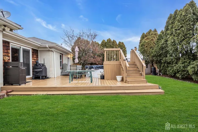 a view of a house with a yard porch and sitting area