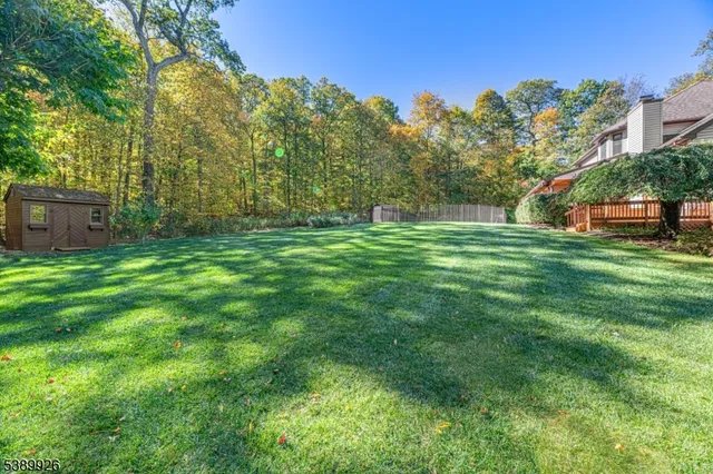 a view of a patio with wooden floor of a house