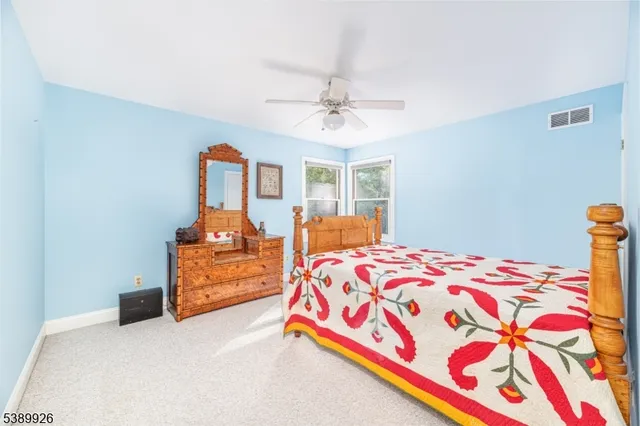 a view of balcony with wooden floor