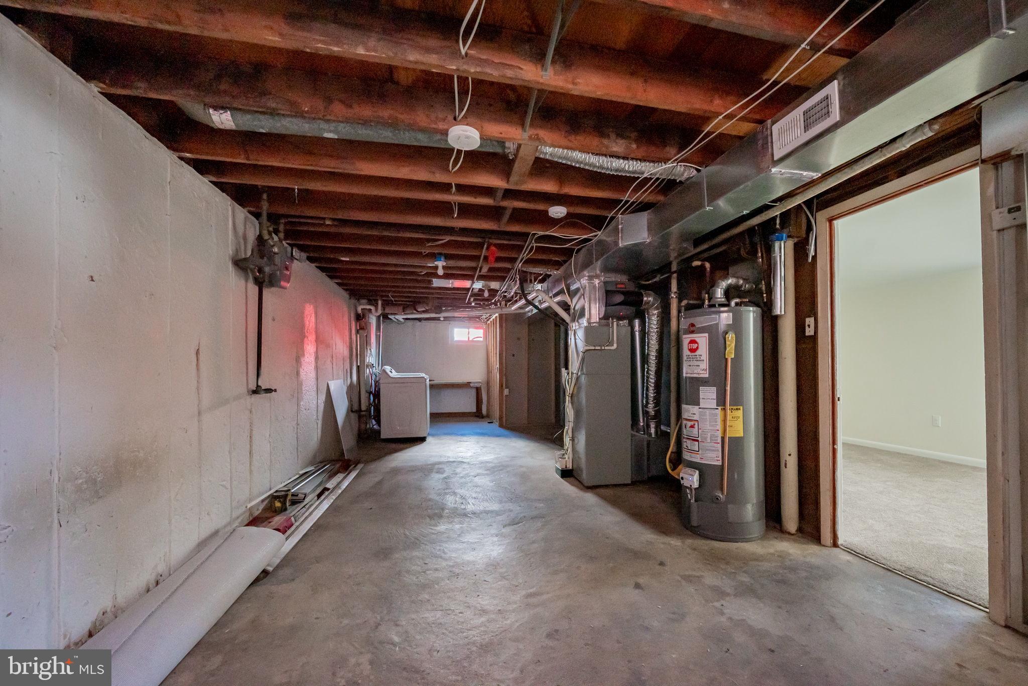 25 Cornwall Road New Castle, DE 19720 - Photo 23 of 26 Unfinished Area with Storage & Laundry