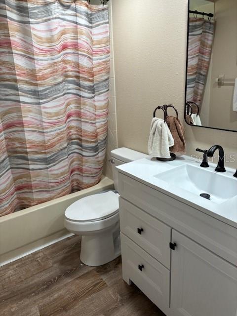 7421 Glasgow Road Weeki Wachee, FL 34613 - Photo 7 of 11 a bathroom with a sink toilet and shower
