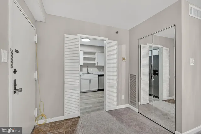 a view of a bathroom with a shower and a sink