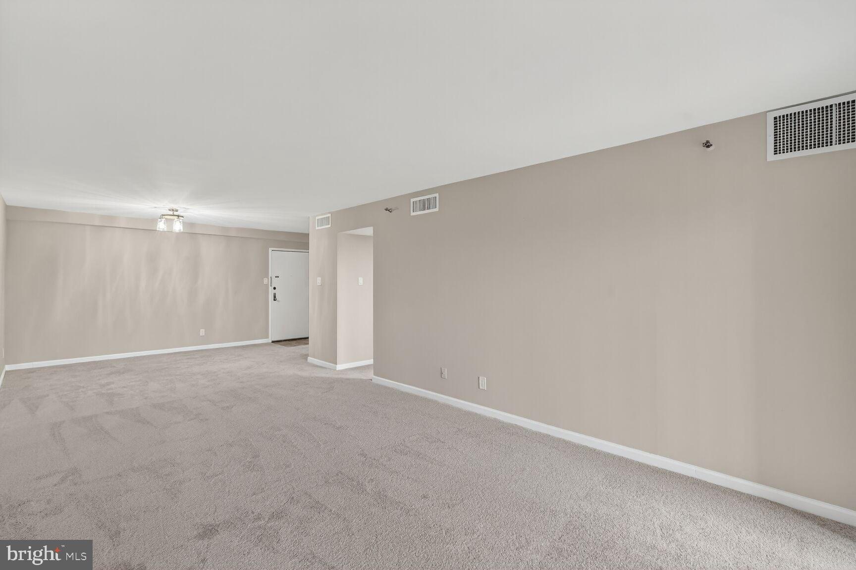 9200 Edwards Way, Unit 811 Hyattsville, MD 20783 - Photo 6 of 15 a view of an empty room
