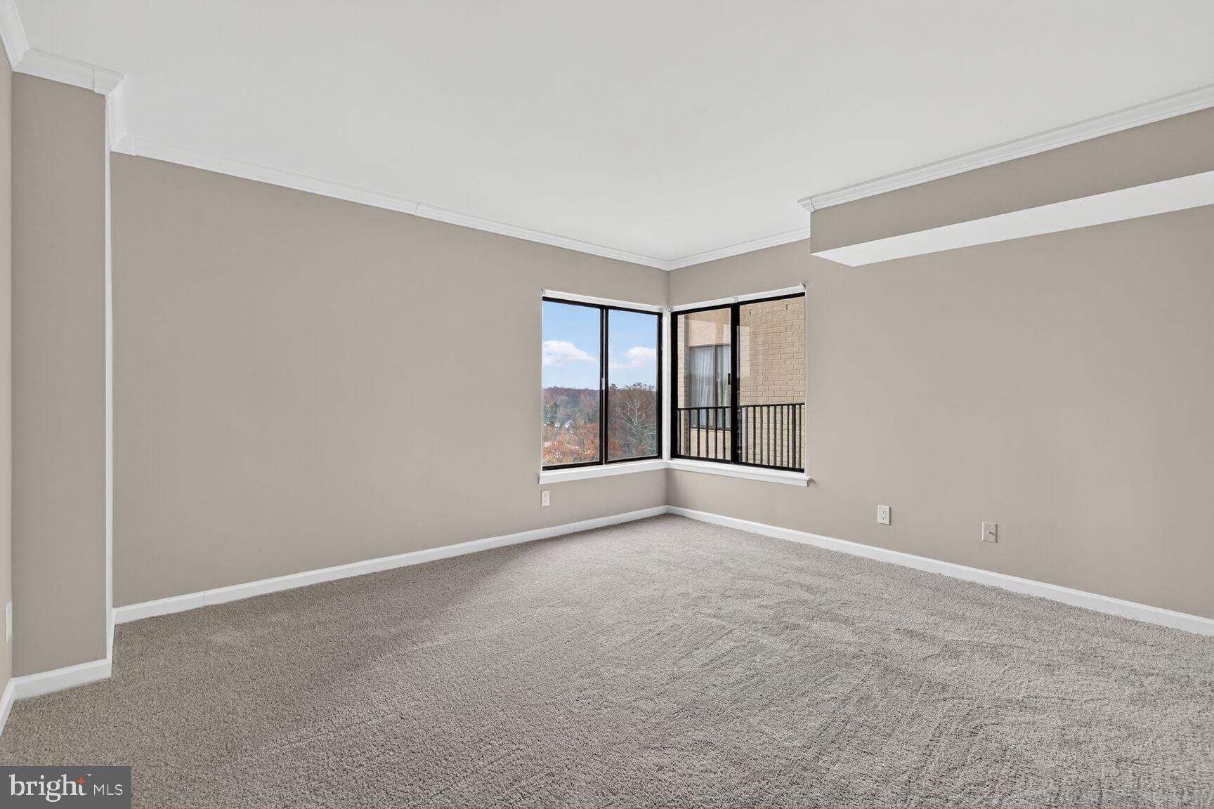 9200 Edwards Way, Unit 811 Hyattsville, MD 20783 - Photo 7 of 15 a view of an empty room with a window