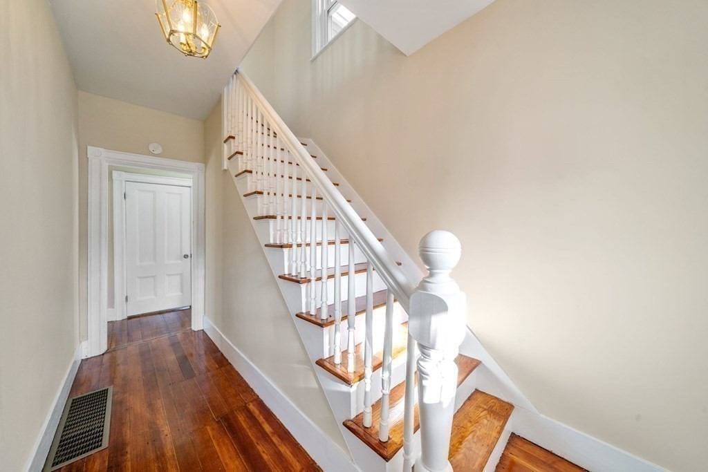 85 Barrows Street Dedham, MA 02026 - Photo 13 of 31 a view of entryway with wooden floor