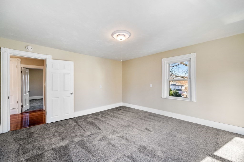85 Barrows Street Dedham, MA 02026 - Photo 20 of 31 an empty room with windows and closet