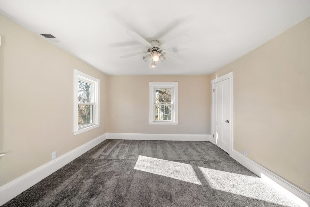 85 Barrows Street Dedham, MA 02026 - Photo 21 of 31 a view of an empty room with a window
