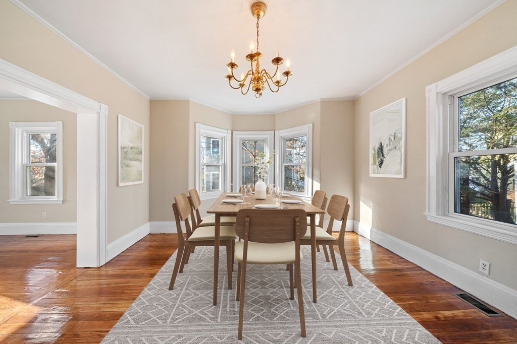 85 Barrows Street Dedham, MA 02026 - Photo 4 of 31 a view of a dining room with furniture window and wooden floor