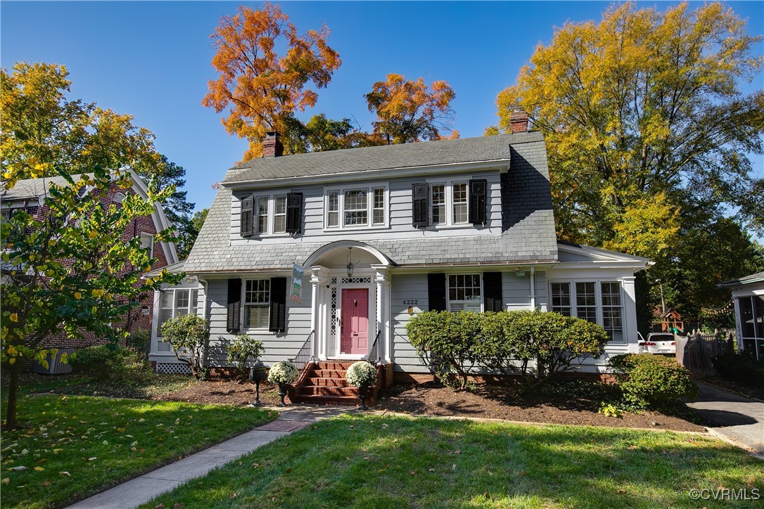 4222 Seminary Avenue Richmond, VA 23227 - Photo 2 of 50 a front view of a house with a garden
