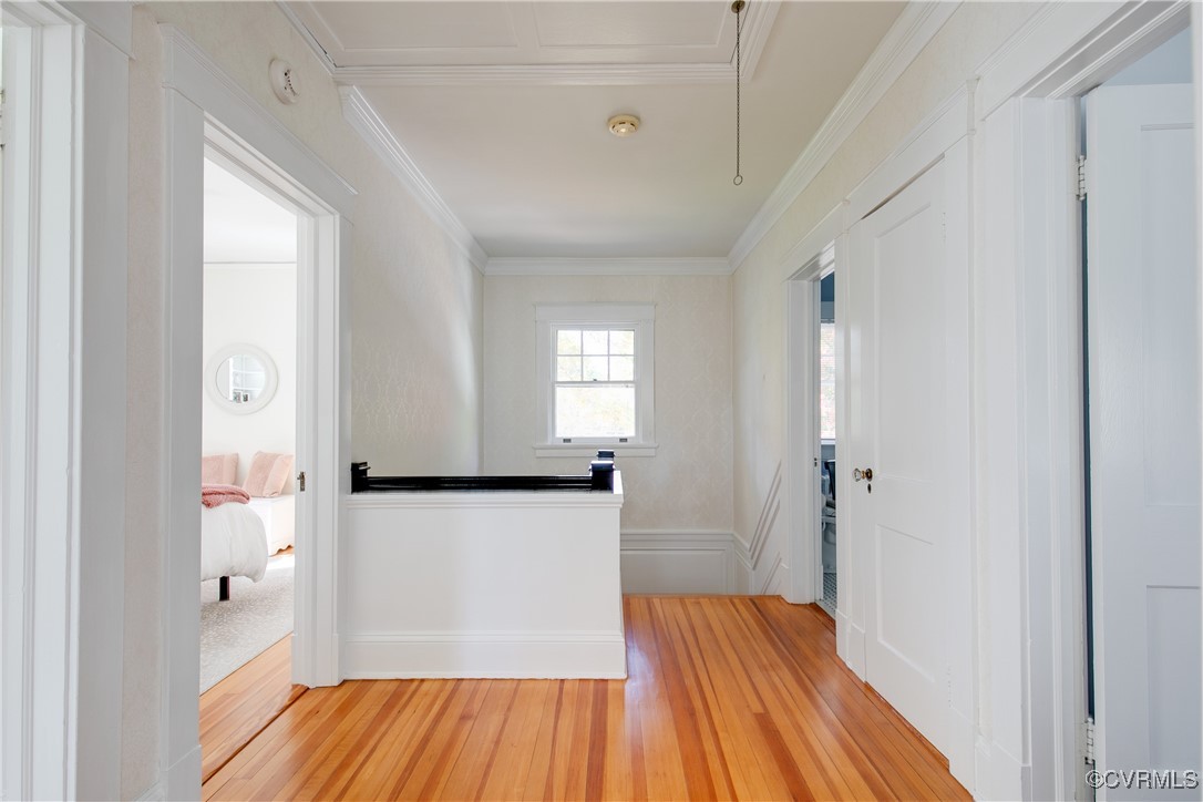 4222 Seminary Avenue Richmond, VA 23227 - Photo 32 of 50 a hallway view with wooden floor and staircase