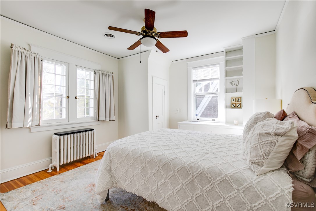 4222 Seminary Avenue Richmond, VA 23227 - Photo 38 of 50 a bedroom with a large bed and a window