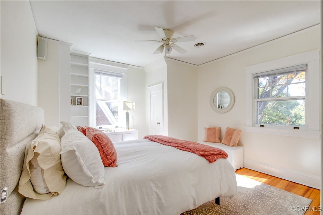 4222 Seminary Avenue Richmond, VA 23227 - Photo 40 of 50 a bedroom with a bed and window