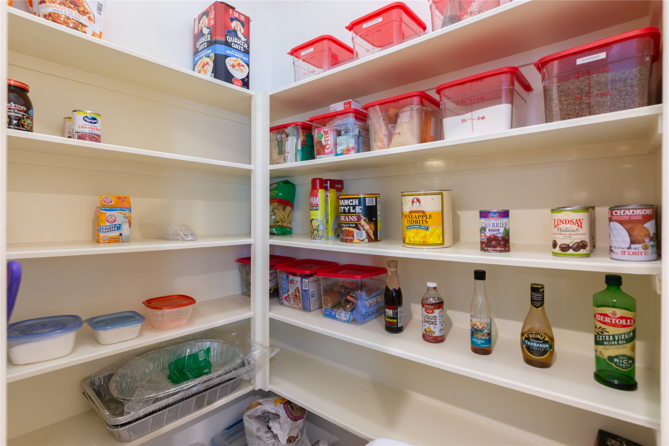 1241 Prince Street Houston, TX 77008 - Photo 27 of 45 a utility room with lots of clutter and cabinets