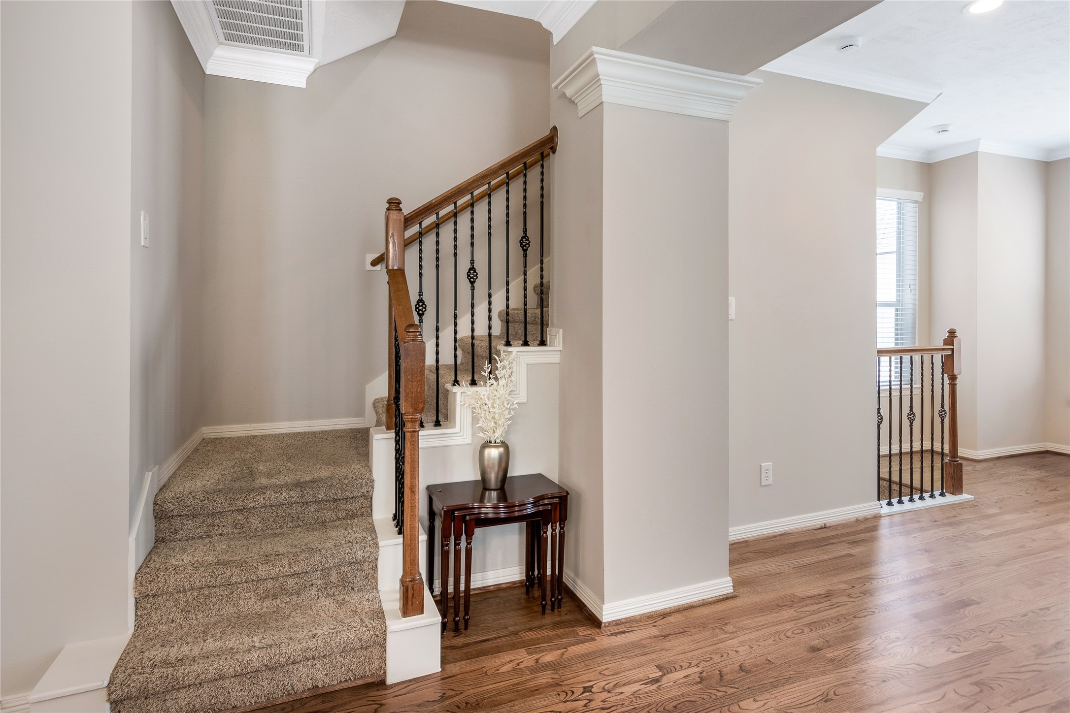 1241 Prince Street Houston, TX 77008 - Photo 29 of 45 a view of staircase with wooden floor and chair