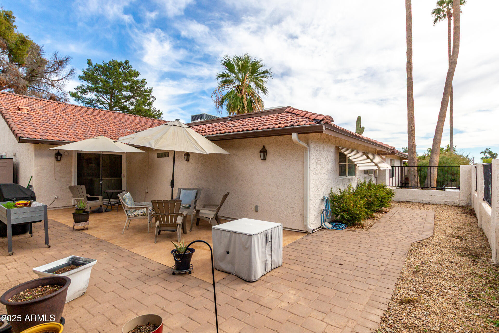 12210 South Potomac Street Phoenix, AZ 85044 - Photo 32 of 42 palm trees and sunny skies