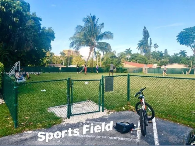 a view of a lake with a garden