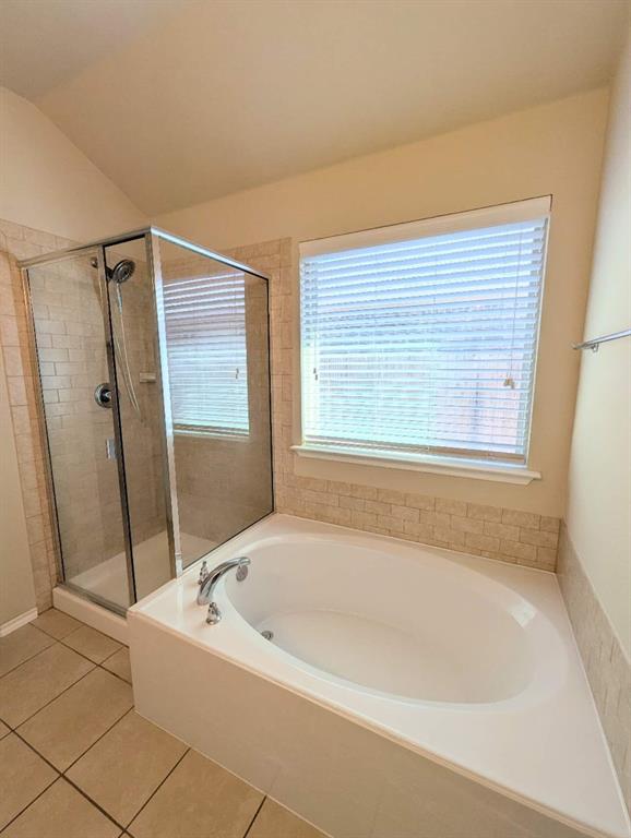 2110 Spruce Street Anna, TX 75409 - Photo 9 of 13 a white bath tub sitting next to a window
