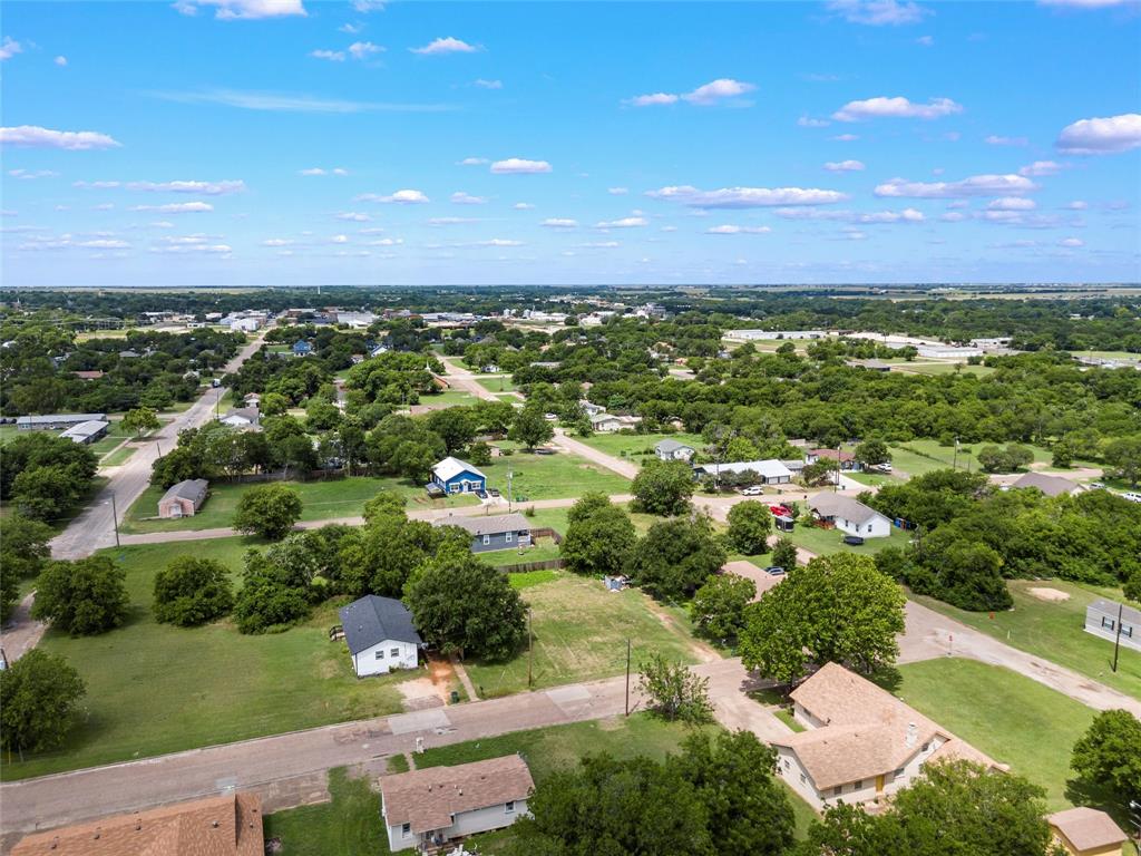 Tbd Pullen Street McGregor, TX 76657 - Photo 6 of 11 an aerial view of residential houses with outdoor space and trees