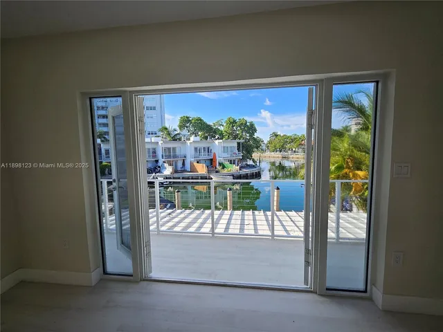 a view of a hallway view with staircase