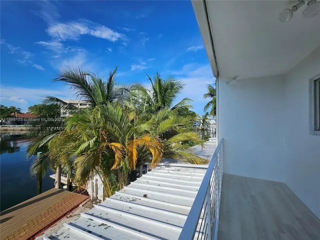 a view of kitchen with wooden floor