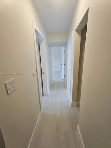 a bathroom with a toilet a sink and a shower