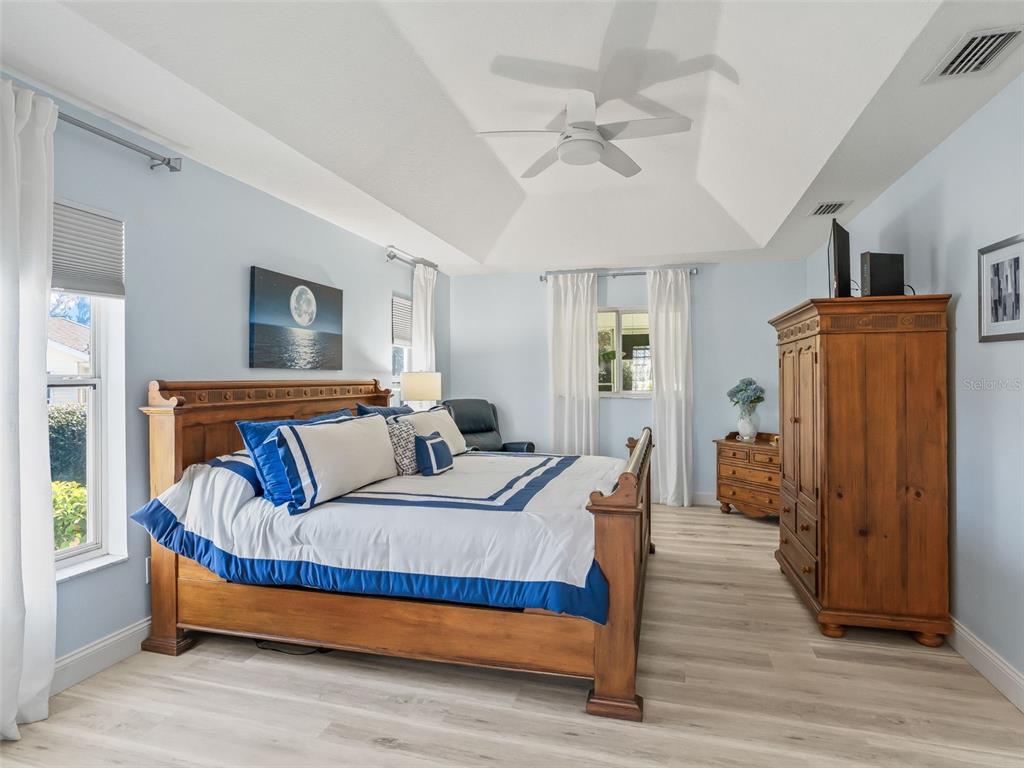 5016 Northwest 18th Street Ocala, FL 34482 - Photo 21 of 40 a bedroom with bed and wooden floor