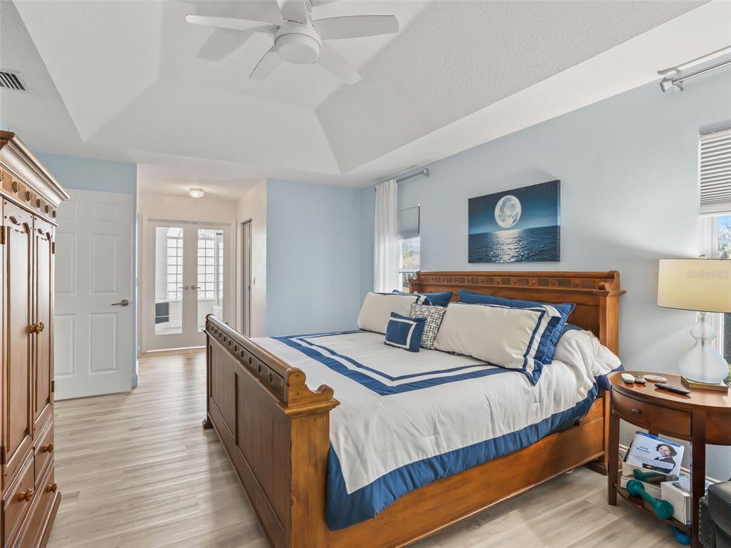 5016 Northwest 18th Street Ocala, FL 34482 - Photo 22 of 40 a bedroom with bed and wooden floor