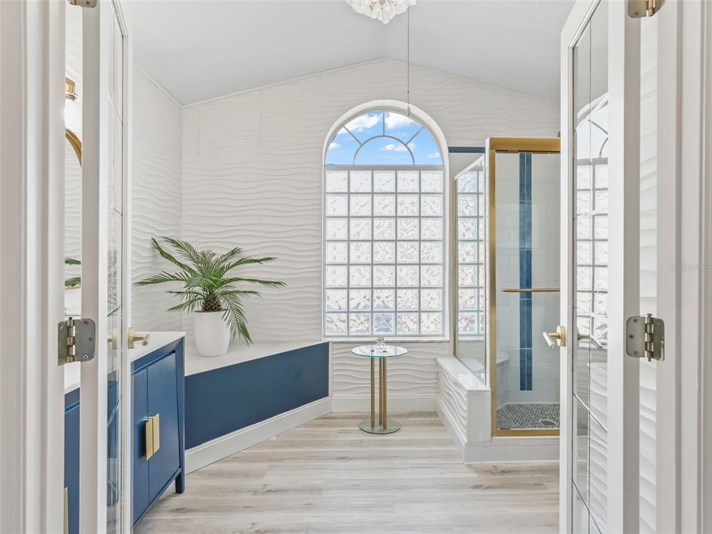 5016 Northwest 18th Street Ocala, FL 34482 - Photo 23 of 40 a view of entryway with a front door and wooden floor