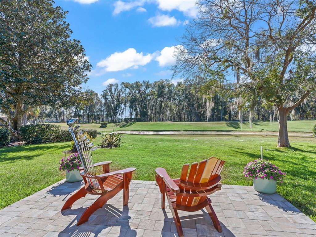5016 Northwest 18th Street Ocala, FL 34482 - Photo 3 of 40 a view of a table and chairs in the garden