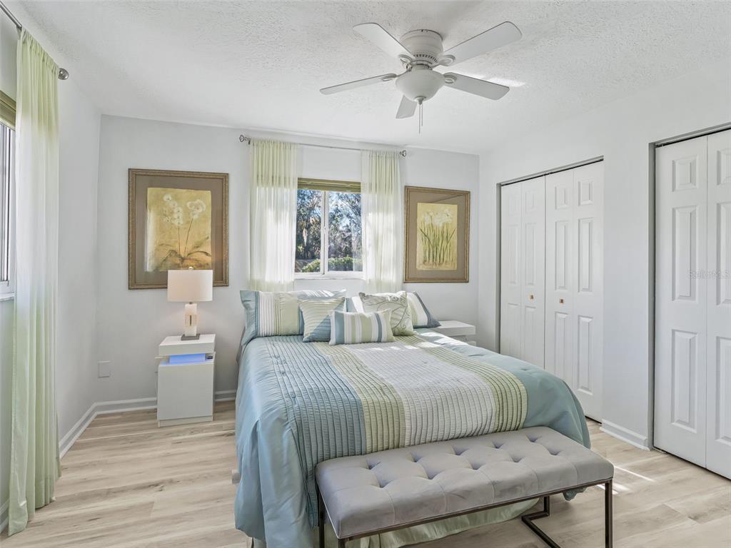 5016 Northwest 18th Street Ocala, FL 34482 - Photo 31 of 40 a bedroom with a bed and wooden floor