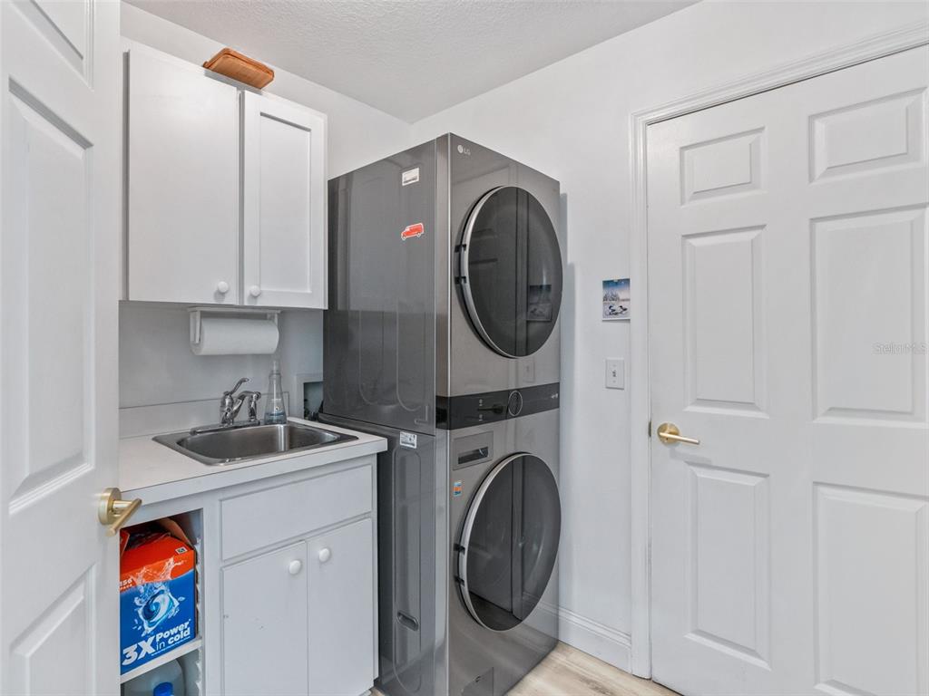 5016 Northwest 18th Street Ocala, FL 34482 - Photo 33 of 40 a utility room with sink dryer and washer