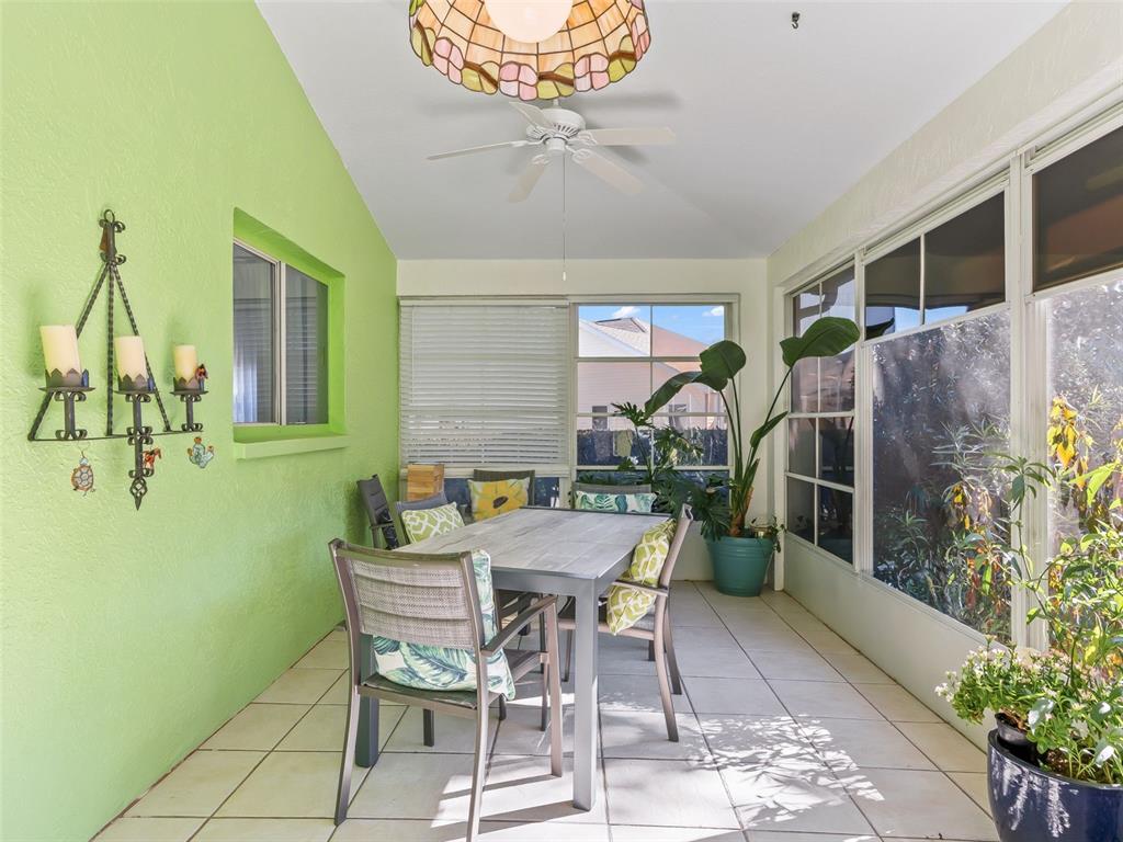 5016 Northwest 18th Street Ocala, FL 34482 - Photo 35 of 40 a view of a dining room with furniture and chandelier