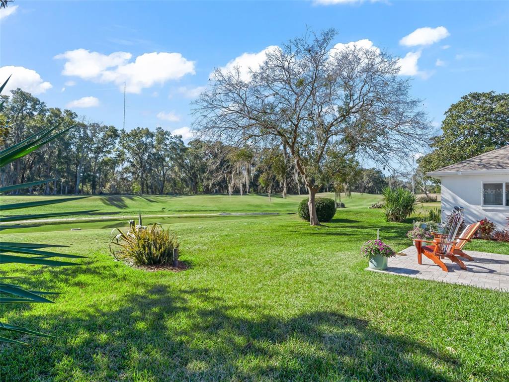 5016 Northwest 18th Street Ocala, FL 34482 - Photo 5 of 40 a view of a park with large trees