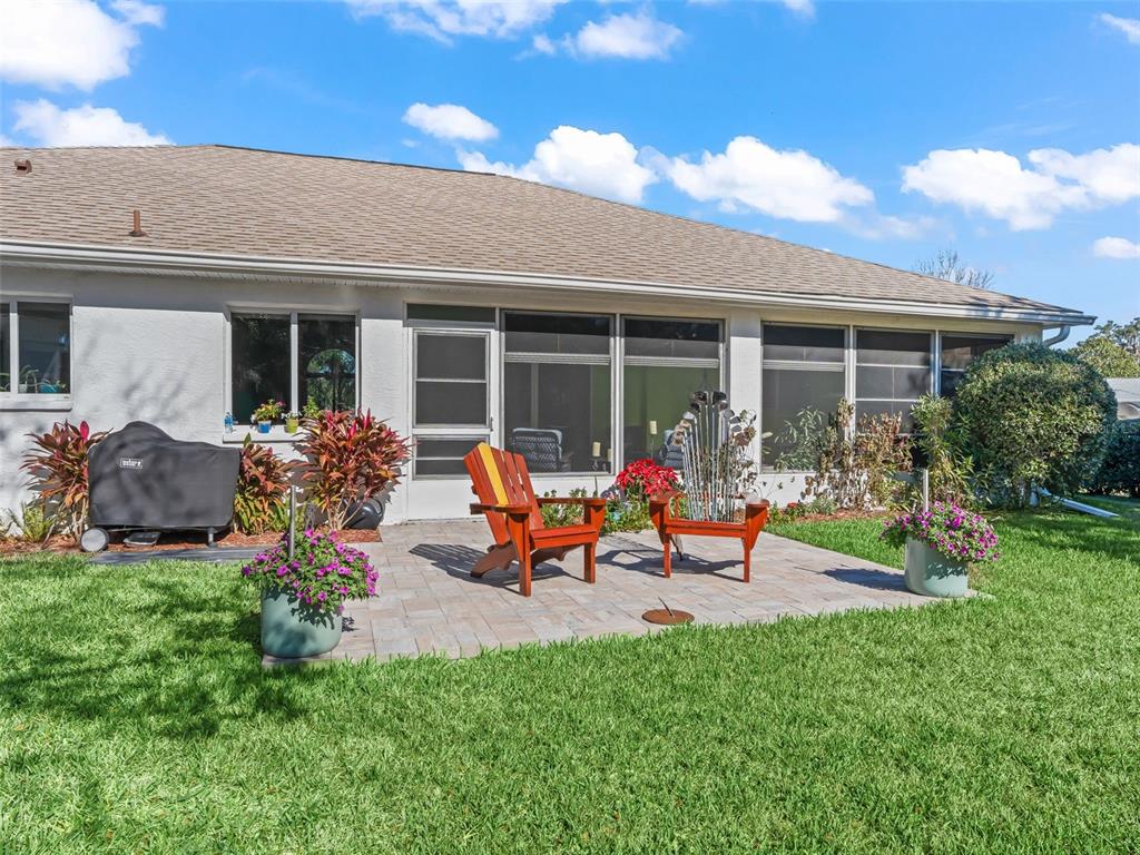 5016 Northwest 18th Street Ocala, FL 34482 - Photo 6 of 40 a view of a house with backyard sitting area and garden