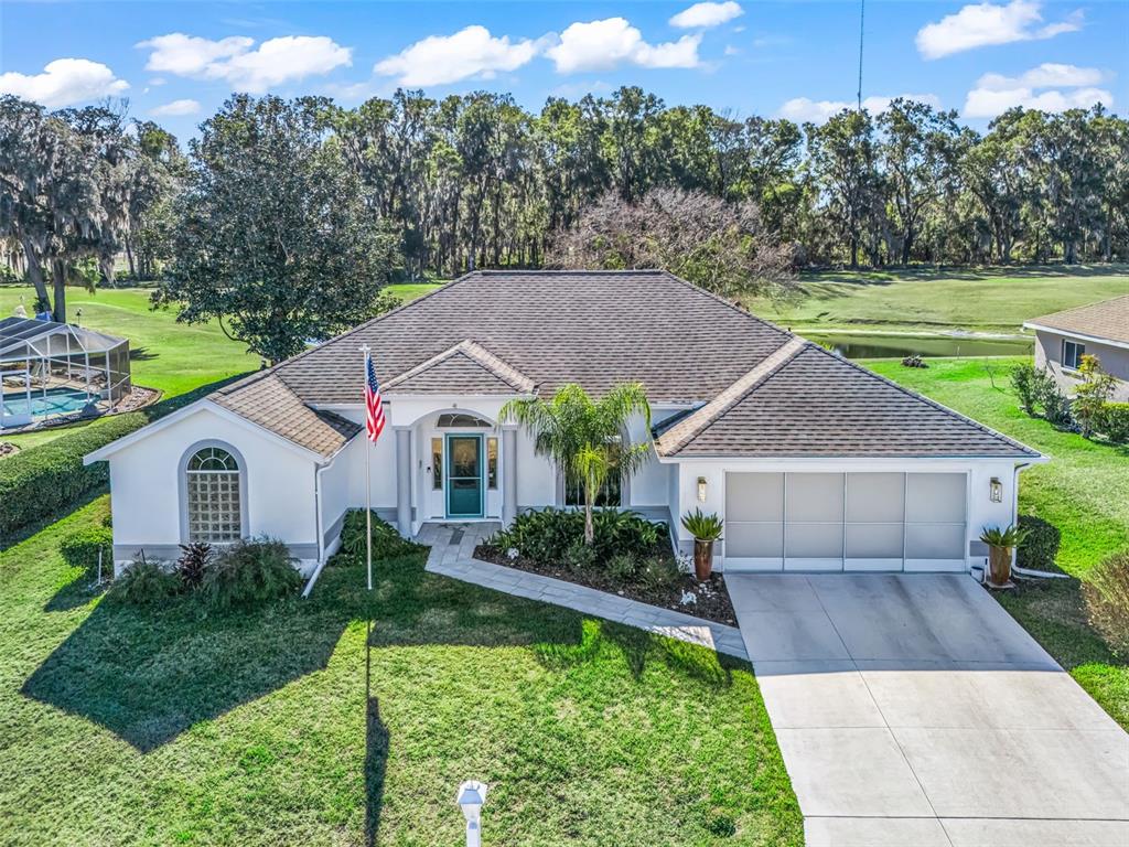 5016 Northwest 18th Street Ocala, FL 34482 - Photo 7 of 40 a aerial view of a house with a yard and plants