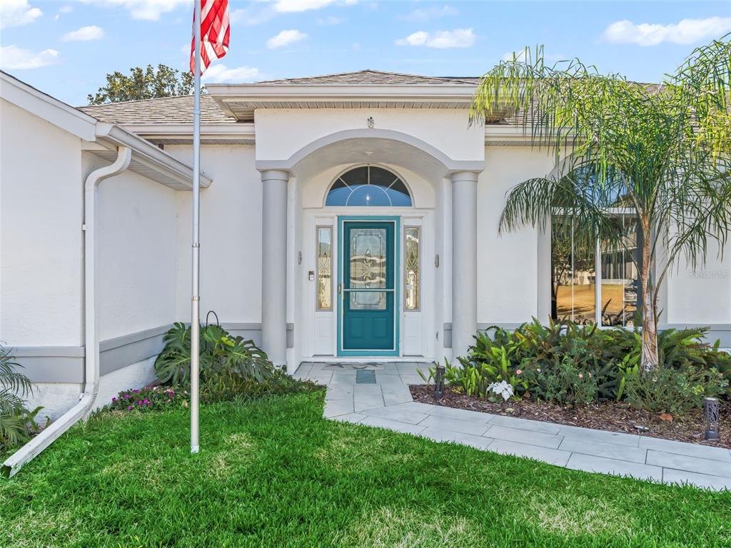 5016 Northwest 18th Street Ocala, FL 34482 - Photo 9 of 40 a view of a house with a small yard and plants