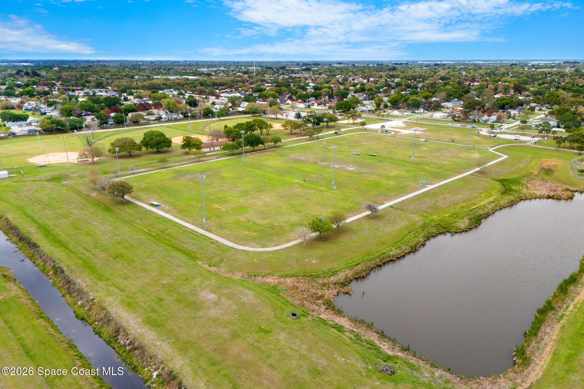 110 Turpial Way, Unit 102 Melbourne, FL 32901 - Photo 20 of 23 a view of a city