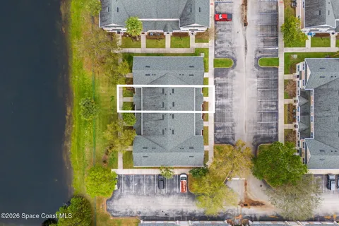 aerial view of a house with a swimming pool