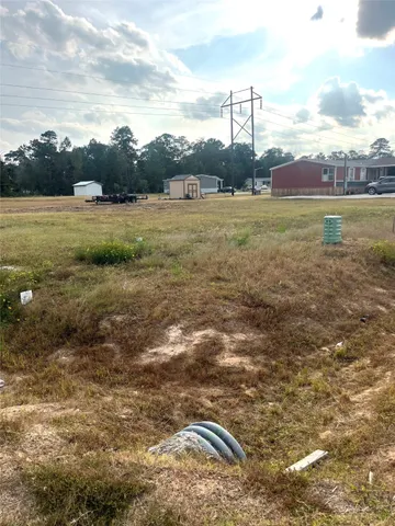 a view of a town with mountains in the background