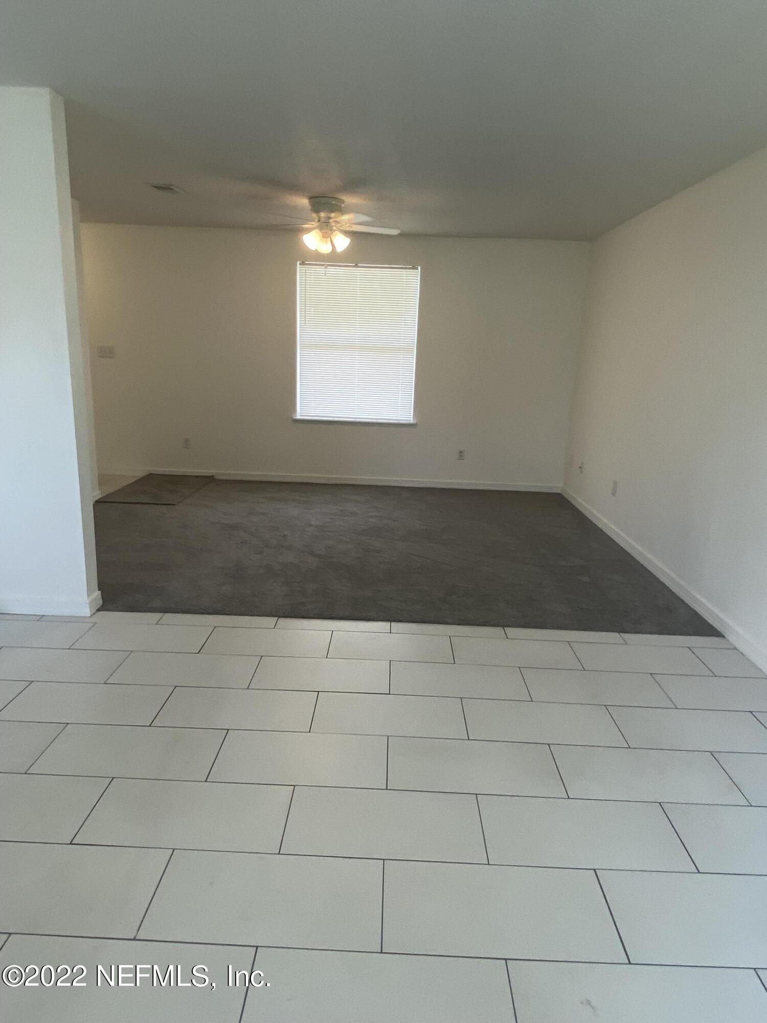 136 Park Road Interlachen, FL 32148 - Photo 8 of 28 Dining area into living room